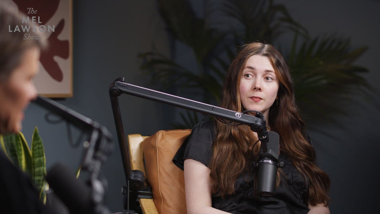 Liv Evans in the guest chair, mid-conversation, in episode four